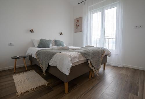 Ένα ή περισσότερα κρεβάτια σε δωμάτιο στο Villa Vita