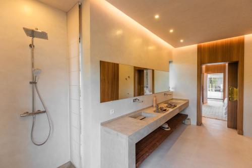 a bathroom with a sink and a mirror on the wall at LUXURY VILLA 7 in Marrakesh