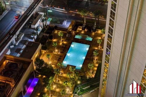 an overhead view of a hotel courtyard with a swimming pool at MGM Signature-28-705 F1 Track & Strip View Balcony in Las Vegas