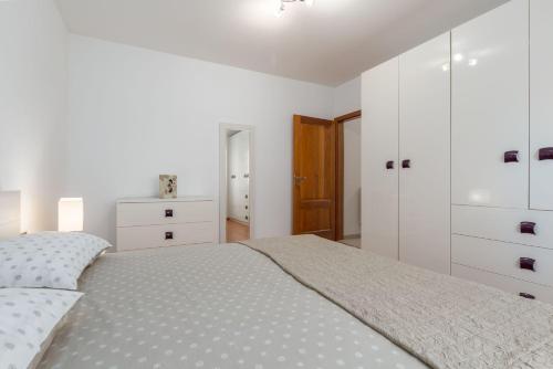Ένα ή περισσότερα κρεβάτια σε δωμάτιο στο Villa Lori