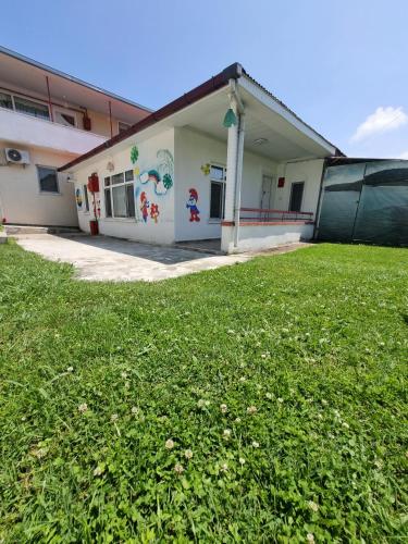 a building with a mural on the side of it at seasidehouse in Ordu