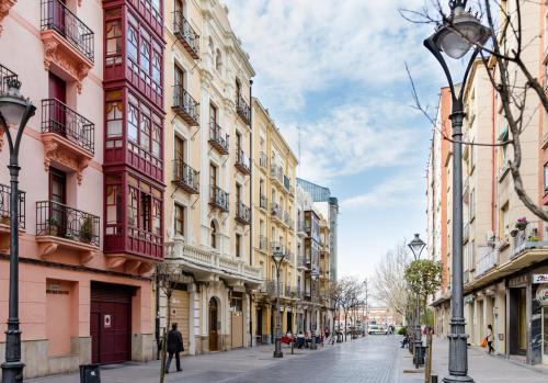a street in a city with tall buildings at Pension Logroño in Logroño
