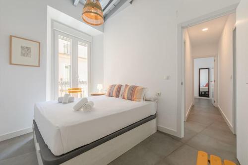 Postel nebo postele na pokoji v ubytování Céntrico, acogedor y amplio piso en Sevilla