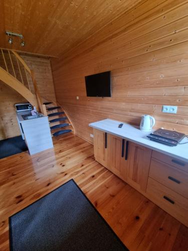 TV a/nebo společenská místnost v ubytování Cztery Pory Roku
