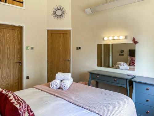 A bed or beds in a room at Tranquillity-uk38552