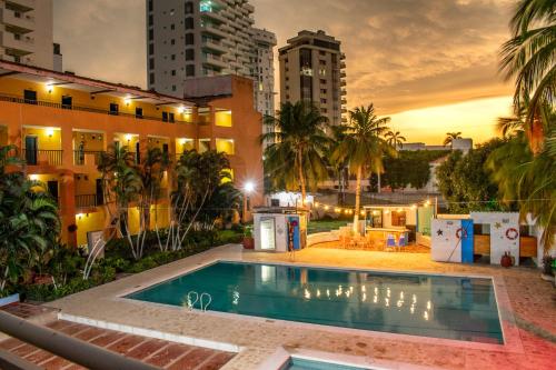 Piscina en o cerca de Hotel Palmarena Plaza Rodadero
