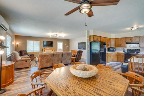 a kitchen and living room with a table and chairs at Roosevelt Suite Less Than 1 Mi to Teddy Roosevelt Park! in Medora