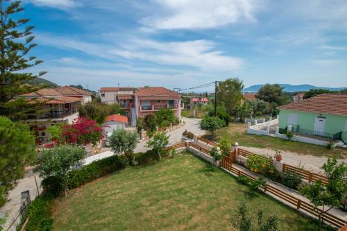 an aerial view of a yard in a residential neighborhood at Liri's Apartments in Kalamaki