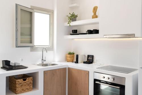 Cuisine ou kitchenette dans l'établissement Maeva Suites Santorini