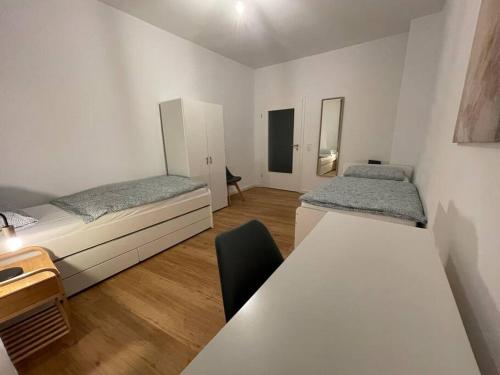 En eller flere senge i et værelse på 70qm - 3 rooms - free parking - city - MalliBase Apartments