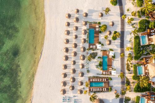 an aerial view of a resort on the beach at Fairmont Mayakoba in Playa del Carmen