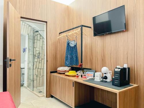 Příslušenství pro přípravu čaje a kávy v ubytování Messapica Home
