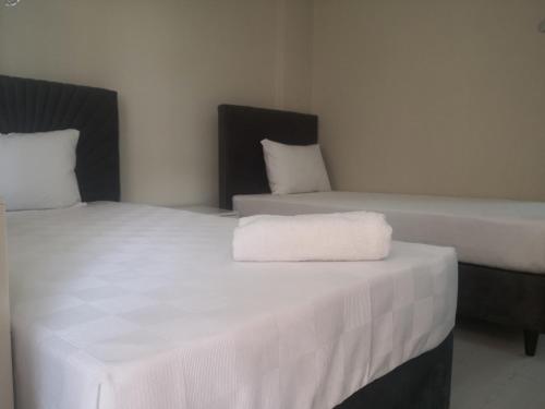 EST Suite Apartにあるベッド