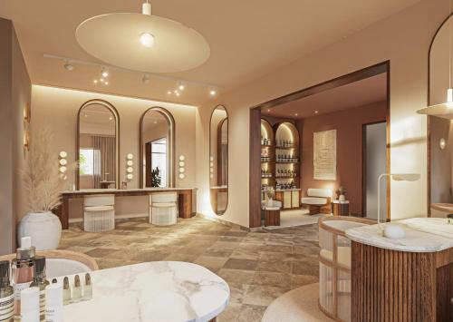 a salon with mirrors on the wall and a hair salon at Fairmont Mayakoba in Playa del Carmen
