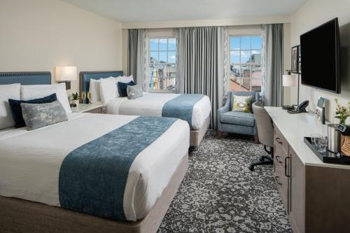 Ένα ή περισσότερα κρεβάτια σε δωμάτιο στο Four Points by Sheraton French Quarter