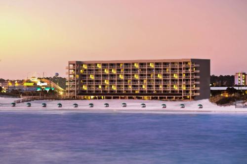 a hotel on the beach in front of the water at Four Points by Sheraton Destin - Fort Walton Beach in Fort Walton Beach