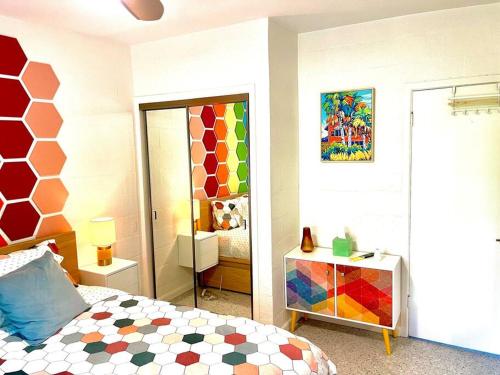 A bed or beds in a room at The Flamingo Palms private 1bd 1ba Unit in Duplex