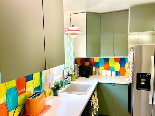 A kitchen or kitchenette at The Flamingo Palms private 1bd 1ba Unit in Duplex