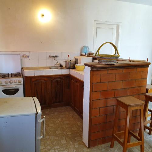 a kitchen with a sink and a counter top at Villa Duchesse in Sali Nianiaral