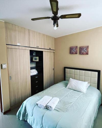 Postel nebo postele na pokoji v ubytování Acogedora casa en ica