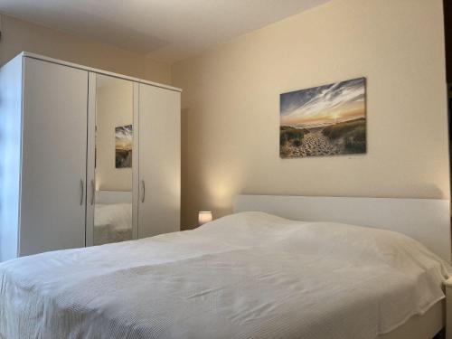 מיטה או מיטות בחדר ב-Lindenhof-WE-5