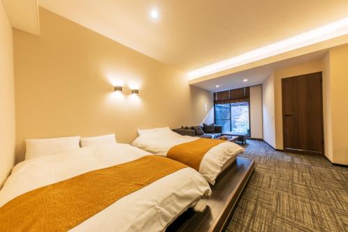 Cama o camas de una habitación en Sengokuhara Hisanoha