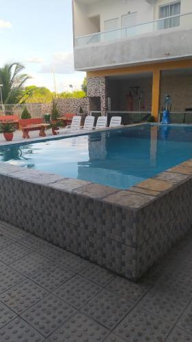 Der Swimmingpool an oder in der Nähe von Pousada Tropical Paulo Afonso