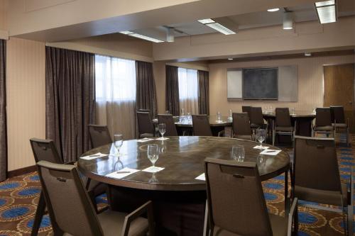a conference room with a large table and chairs at Sheraton Anchorage Hotel in Anchorage