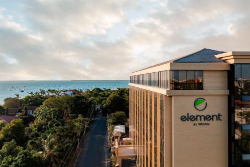 a view of a building with the ocean in the background at Element by Westin Hotel Dar es Salaam in Dar es Salaam