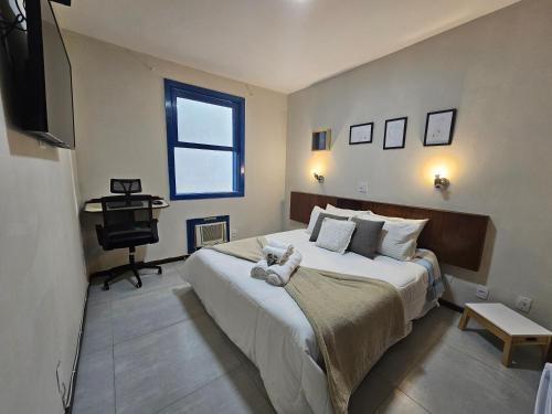 Ένα ή περισσότερα κρεβάτια σε δωμάτιο στο Hotel Princesinha do Café