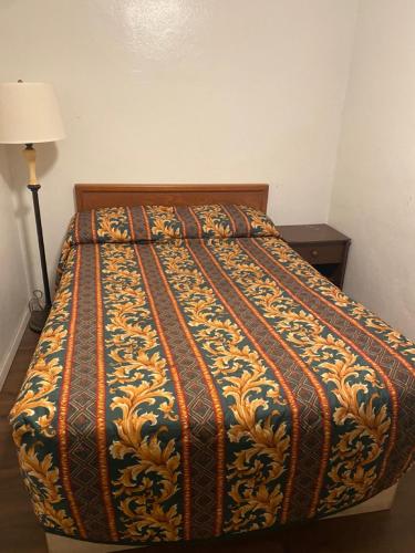 Postel nebo postele na pokoji v ubytování Johnston's Motel