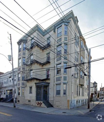 a building with stairs on the side of it at 135 Hawthorne ave in Yonkers