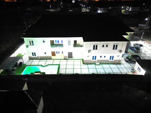 an aerial view of a house with a swimming pool at Havre Luxury Apartment in Abuja