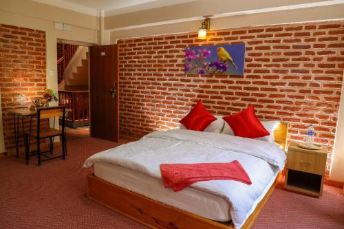 Postel nebo postele na pokoji v ubytování Kaji Chhen Homestay