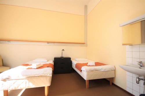 Katil atau katil-katil dalam bilik di Forenom Hostel Röykkä