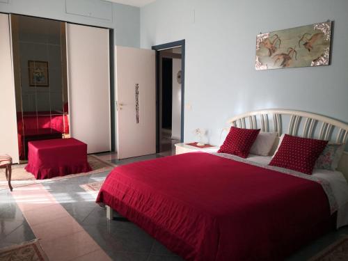 Postel nebo postele na pokoji v ubytování B&B Villa Lena