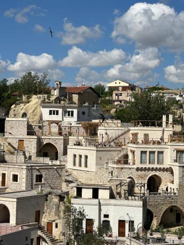 a group of buildings on top of a hill at Vie Cappadocia - Adults Only in Nevsehir