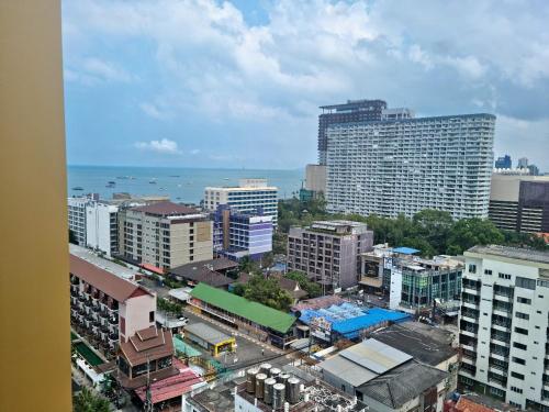 a view of a city with buildings and the ocean at EDGE Central pattaya near walking street in Pattaya Central