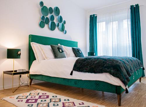 Postel nebo postele na pokoji v ubytování R213 Residences Botanique