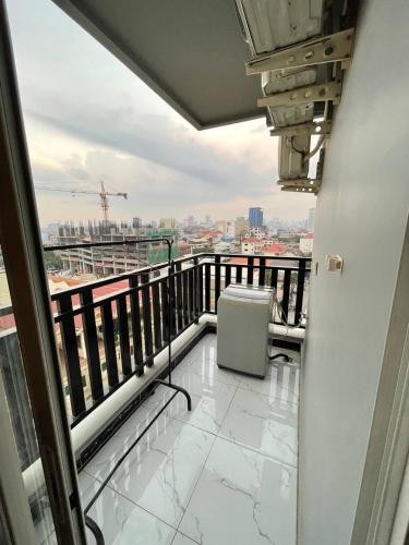 a balcony with a view of a city at Residence L two bedroom in Phnom Penh