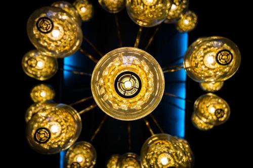 a bunch of glass balls hanging from a ceiling at Elizabeth Hotel in Bangkok