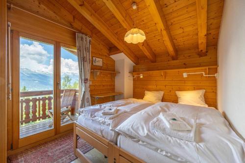 Postel nebo postele na pokoji v ubytování Chalet Le Papillon - Calm, sunny, spacious