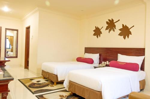BI Executive Hotelにあるベッド