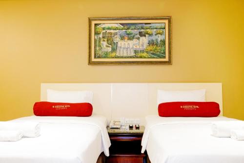 BI Executive Hotelにあるベッド