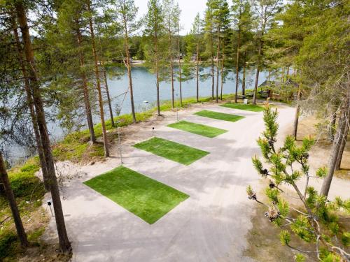 an overhead view of a path with grass and trees at Camp Gielas, Arvidsjaur in Arvidsjaur