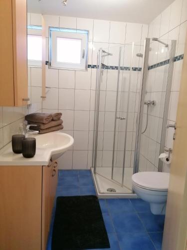 Ένα μπάνιο στο Ferienwohnung Weingut Brutscher
