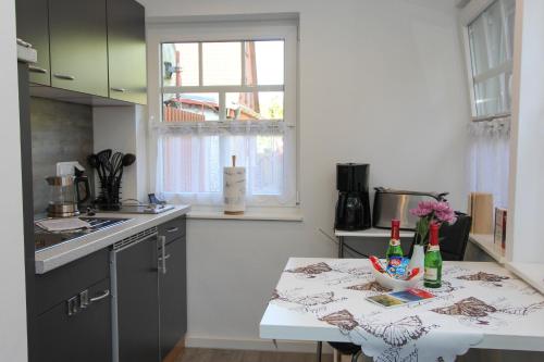Kuchyň nebo kuchyňský kout v ubytování Kleine Veranda