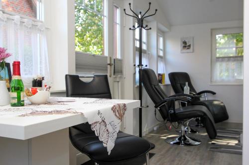 TV a/nebo společenská místnost v ubytování Kleine Veranda