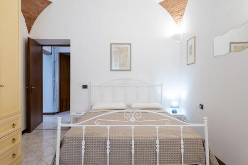 Postel nebo postele na pokoji v ubytování Casa dei Renai by Rentbeat