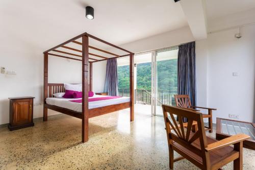 Postel nebo postele na pokoji v ubytování Villa Victoria Edge